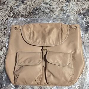 Year of Ours chic preppy coquette minimalist scandinavian style tan backpack